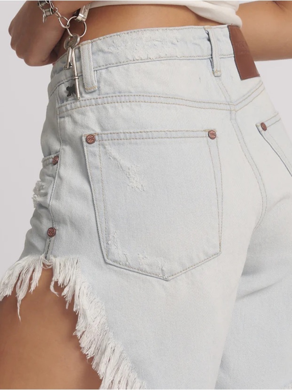One Teaspoon Light Wash Distressed Fringed Jean Shorts